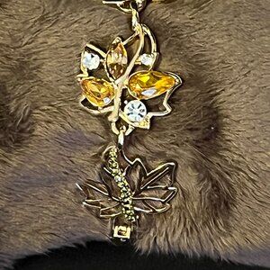 Napier Gold‑Tone Leaf Bracelet with Amber and Green Rhinestones